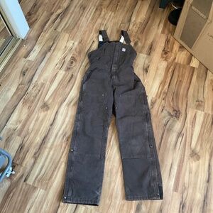 Brown insulated Carhartt overalls
